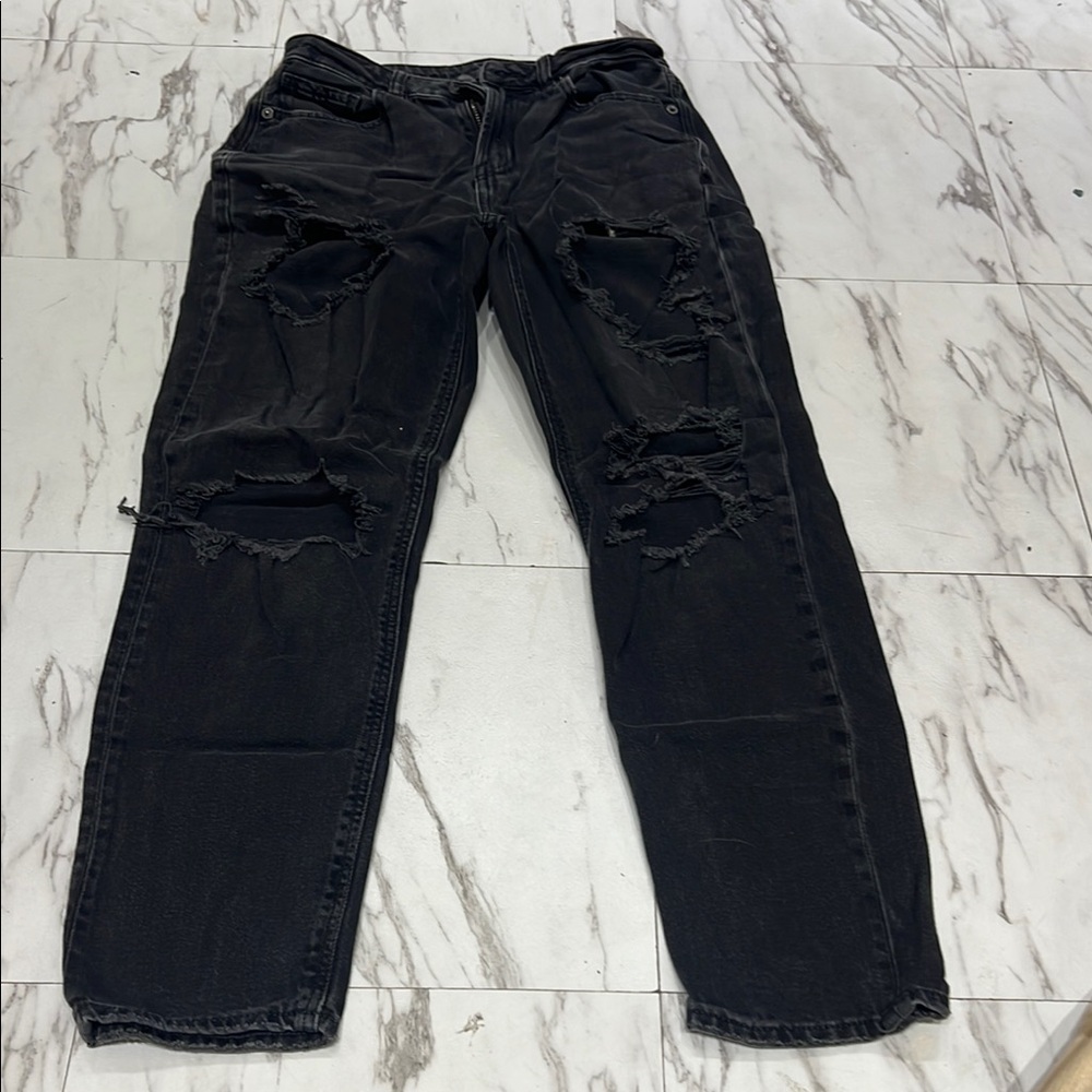 Woman’s Black Distressed Jeans